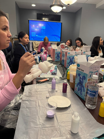 Guests painting and customizing bears during a Boom Bear mobile creative party