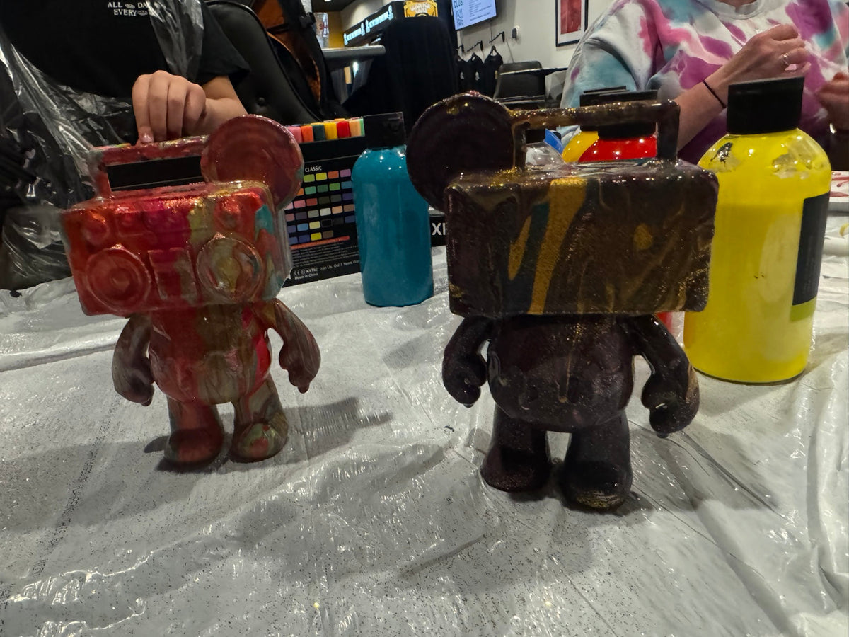 Close view of two finished custom Drip Bears created during a Boom Bear party