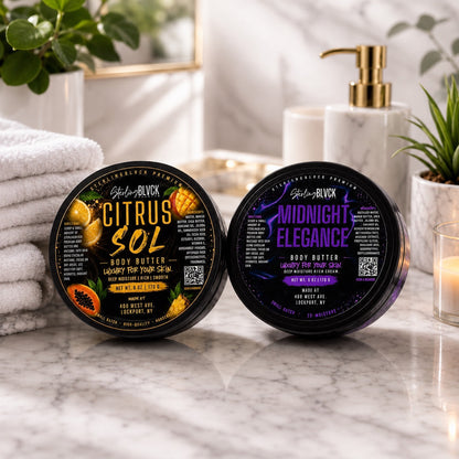 SterlingBLVCK Premium Citrus Sol and Midnight Elegance Body Butter displayed together in a bright bathroom setting.