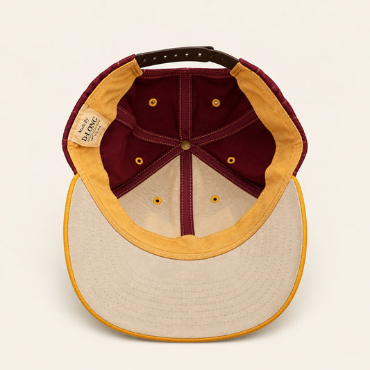 Inside view of vintage burgundy and gold VFW snapback hat with Made by D-Long U.S.A. label